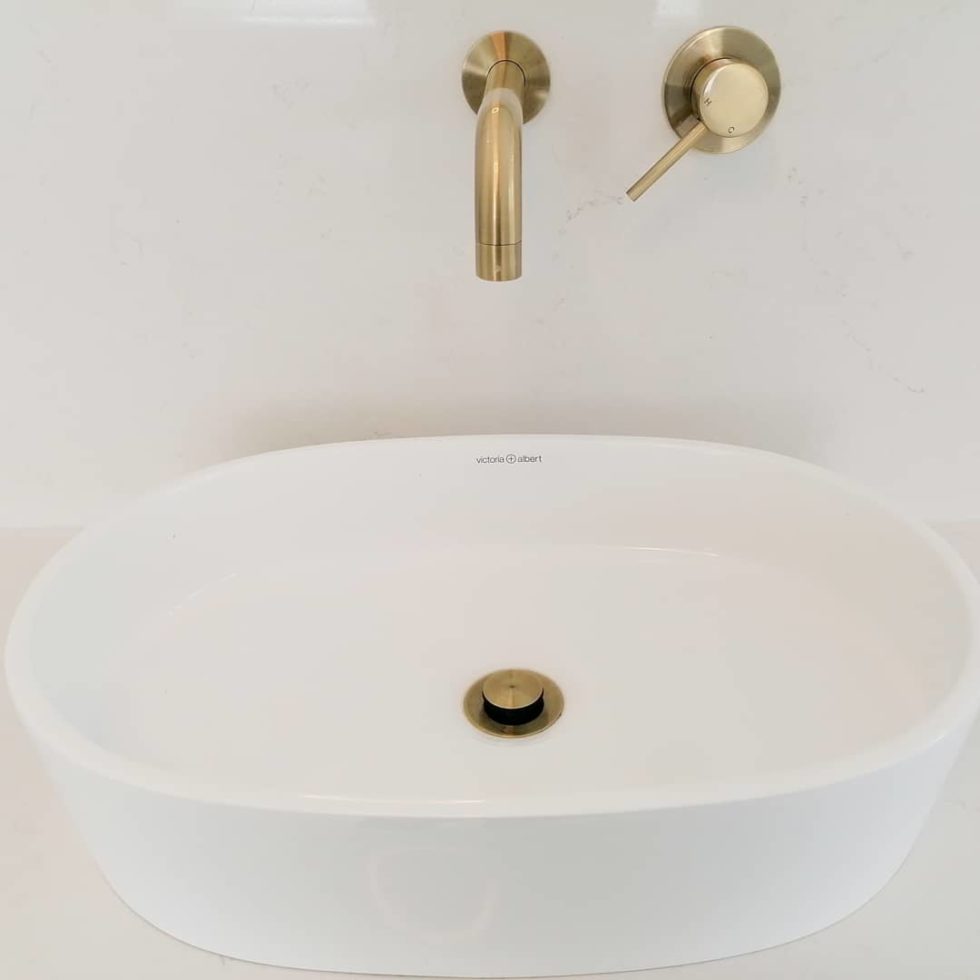 countertop basin with golf accessories